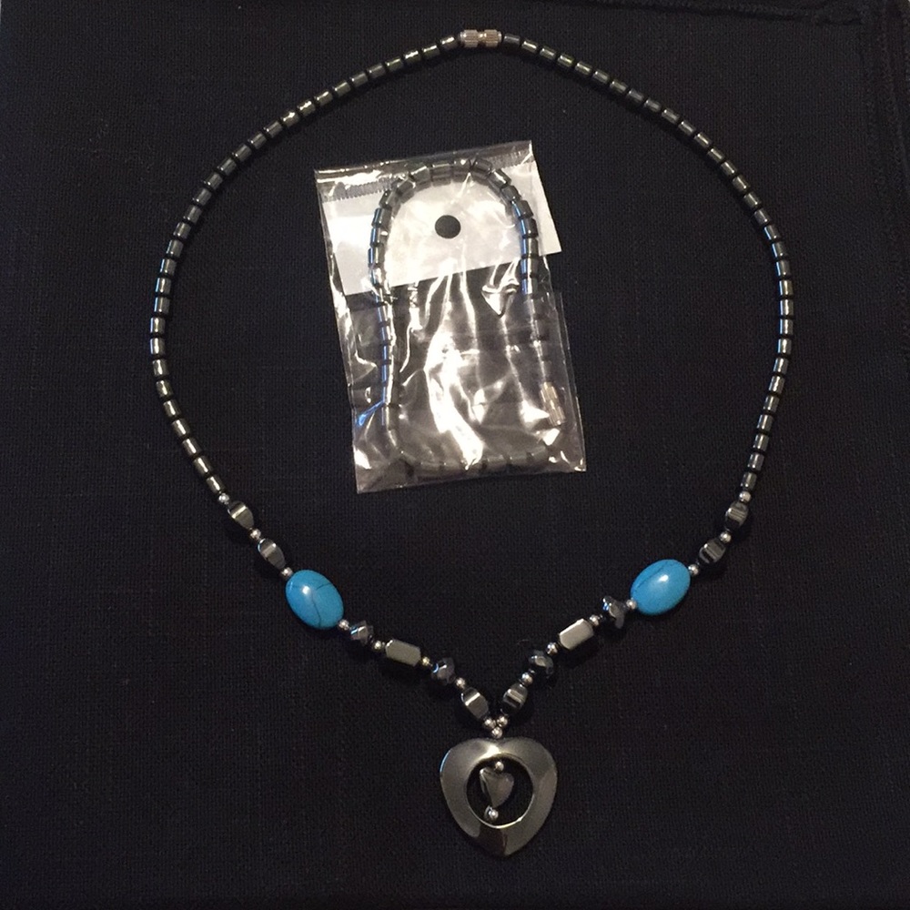 Silver women’s heart necklace and beaded bracelet